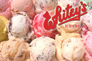 Scoops of ice cream with the Whitey's logo watermarking the photo